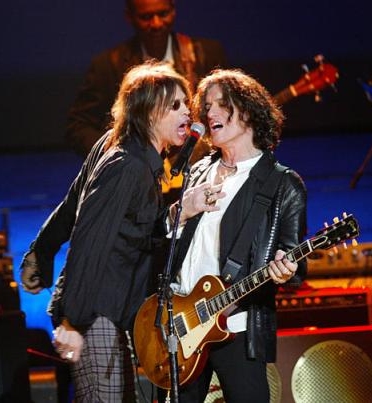 Steve Tyler, left, and Joe Perry perform during the 'Salute to the Blues' concert at Radio City Music Hall on Friday, Feb. 7, 2003, in New York. 2003 has been declared 'The Year of the Blues' by Congress. (AP Photo/Stuart Ramson)
